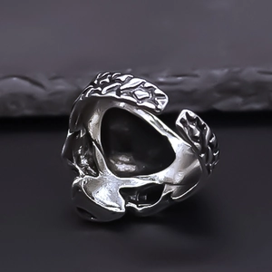 Detailed back view of silver gothic skull ring showing the open adjustable band