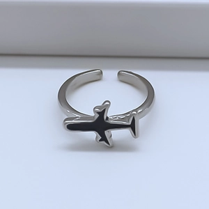 Minimalist silver adjustable airplane ring with black enamel finish for travelers