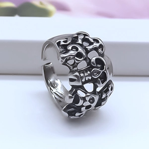 Detailed macro view of the punk style silver alloy skull ring with open adjustable band