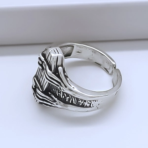 Retro silver punk skull hand ring with nordic rune carvings and oxidized metal finish