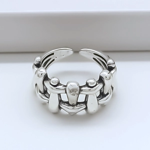 Detail shot of vintage silver open ring featuring a multilayer woven lattice and sphere design