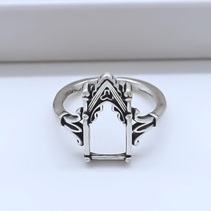 Macro view of gothic arch gateway engraving on silver vintage adjustable ring
