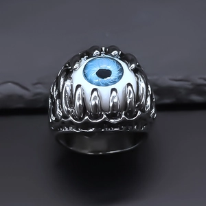 Cool gothic evil eye ring with blue iris and silver metal claws in punk vintage style