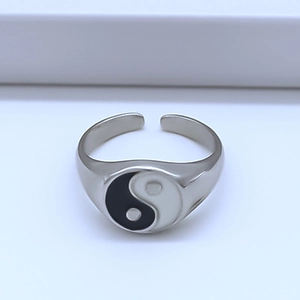Detailed close-up of a Tai Chi Yin Yang adjustable open ring with enamel finish