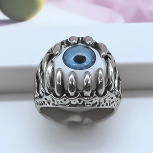 Gothic silver metal ring with blue devil eye centerpiece and punk claw setting
