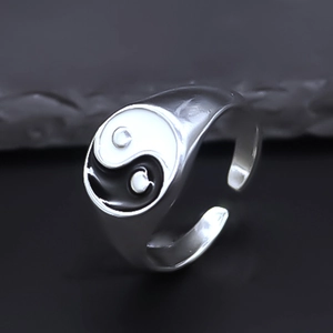 Polished silver adjustable ring featuring a classic black and white Tai Chi Yin Yang design