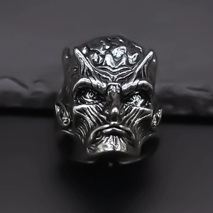 Macro detail of gothic horned monster carving on antique silver adjustable ring