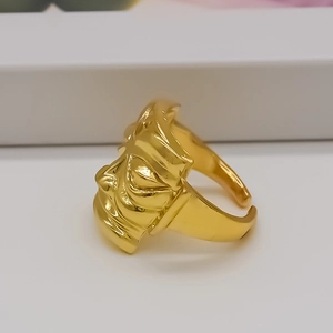 Adjustable golden beast mask ring in chunky alloy with a detailed 45-degree side view