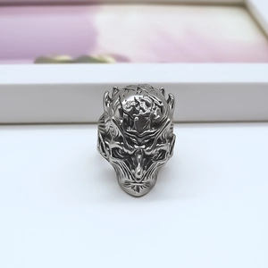 Macro shot of Night King character ring featuring detailed vintage silver metal carving