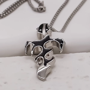 Gothic style silver-tone alloy cross pendant necklace with black enamel detailing