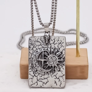 Silver square pendant necklace featuring sun moon relief and beast head clasp design
