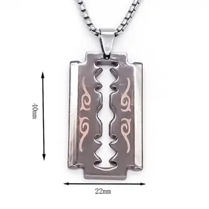 Hip hop razor blade pendant necklace in gunmetal finish with gold totem patterns