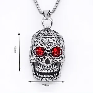 Collier tête de mort en acier inoxydable avec yeux strass rouges et motif gravé vintage