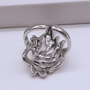 Detailed view of retro peacock hollow feather silver ring with adjustable opening