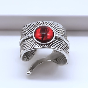 Retro silver feather ring with a central round red gemstone for men in punk style