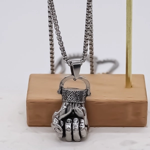 Punk style fist pendant necklace in vintage silver finish with a durable box chain link
