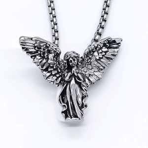 Polished silver angel pendant necklace with a detailed praying wings design and box chain