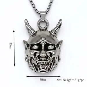 Retro demon mask pendant in vintage silver finish with measurements 45mm by 30mm
