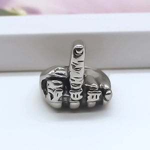 Detailed view of silver gesture ring with vintage distressed finish and hollow finger design