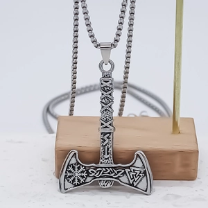 Viking style double-edged axe pendant necklace with Nordic runes on a silver chain