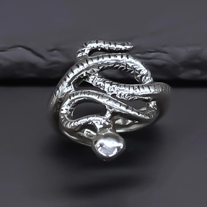 Detailed macro view of the silver octopus snake ring with textured metallic scales