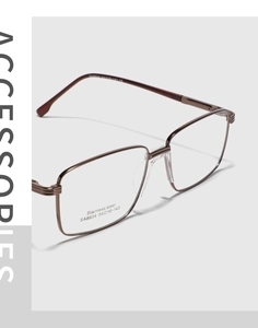 Macro detail of bronze square stainless steel glasses frame showcasing SA8604 model specs