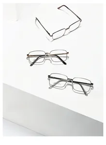 Three variants of rectangle stainless steel glasses frames shown on geometric pedestals