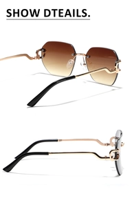 Detailed view of frameless sunglasses with gold wave C-decor temples and brown gradient lenses