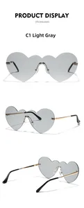 Vues détaillées des lunettes de soleil sans monture en forme de cœur gris clair avec métal doré