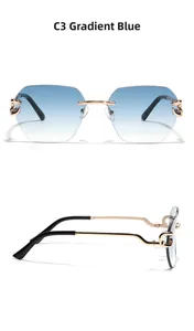 Detail of rimless gradient blue sunglasses with intricate gold hollow metal temples
