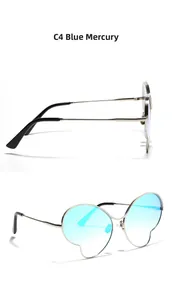 Vue latérale des lunettes papillon avec monture en argent et verres miroirs bleus