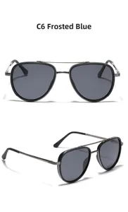 Close-up of matte blue polarized aviator sunglasses showing dual bridge and textured temples