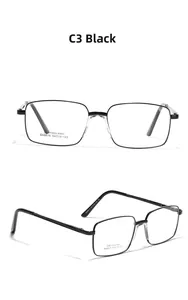Close-up of black rectangular metal eyeglass frame with adjustable nose pads