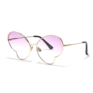 Lunettes de soleil papillon surdimensionnées monture dorée et verres dégradés violets