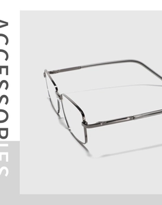 Detail of gunmetal square glasses frame showing textured temples and sleek metal finish