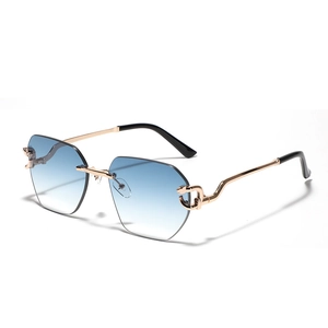 Frameless geometric sunglasses with blue gradient lenses and golden panther hardware