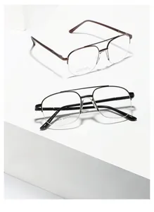 Detailed macro view of black and brown semi-rimless stainless steel eyewear frames