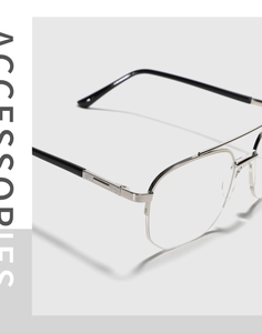 Detailed close-up of silver metal double bridge frame with embossed diamond texture