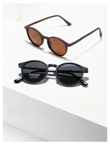 Detailed view of TR7012 polarized round sunglasses with UV400 lenses in black and amber