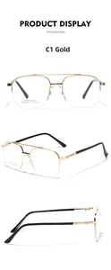 Detail view of gold semi-rimless glasses with stainless steel frame and specs engraving