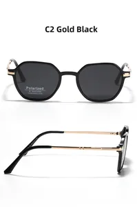 Detail of polarized small square sunglasses with gold black frame and UV400 protection labels