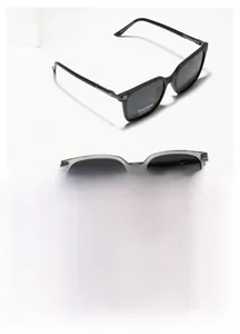 Close-up of polarized TR90 sunglasses with metal accents on minimalist white podium