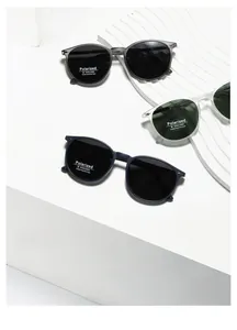 Détail des lunettes de soleil rondes TR7008 polarisées avec rivets et verres UV400