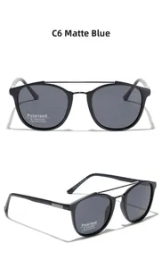 Détail de lunettes de soleil vintage à double pont en bleu mat avec verres polarisés