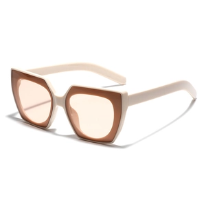 Occhiali da sole cat-eye oversize alla moda con montatura bicolore panna e marrone e lenti