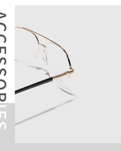 Detailed side view of golden metal aviator semi-rimless frames with black temple arms