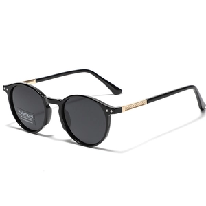 Gafas de sol retro TR90 polarizadas con montura negra y detalles de rejilla dorada