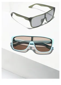 Detail of square oversized sunglasses in olive green and light blue on geometric steps