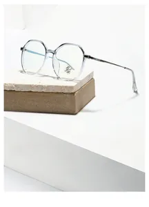Detail of light blue transparent polygon frames with anti-blue light and UV400 lenses
