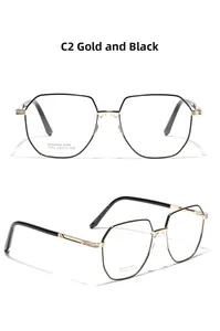 Close-up of polygonal stainless steel glasses frame in C2 Gold Black finish